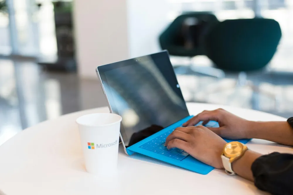 Modern medical office workstation with dual monitors representing HIPAA-compliant Microsoft 365 support for Bergen County medical practices.